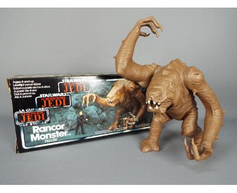 Star Wars - A boxed, vintage, Rancor Monster action figure in tri-logo box, no instructions, model appears in very good condi