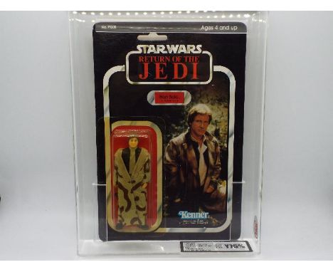Star Wars, Kenner - A graded Kenner 1983 Star Wars ROTJ 'Han Solo (in Trench Coat) 3 3/4"action figure. The figure is UK Grad