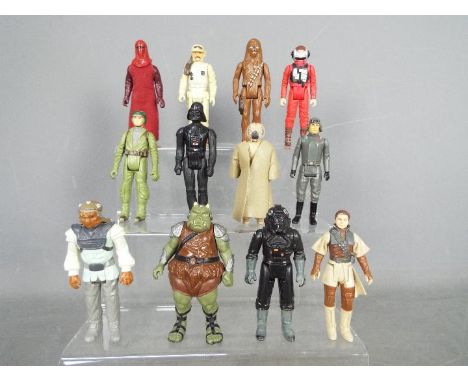 Star Wars, Kenner, Hasbro, LFL, CPG, GMFGI - A regiment of 12 loose vintage Star Wars figures. Lot includes Darth Vader (GMFG