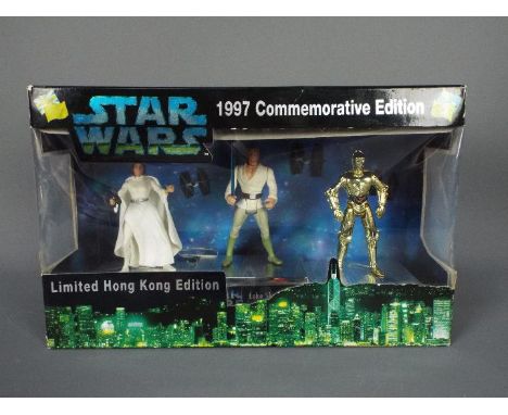 Star Wars, Kenner - A rare boxed Kenner 1997 Commemorative Edition 3/4 action figure set. The set which commemorated the hand