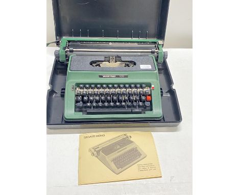 A vintage portable silver reed typewriter (untested), shipping unavailable