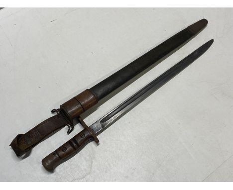 A 1913 pattern WW1 period US made bayonet in original leather scabbard in good condition UK postage only.