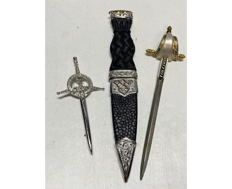 A Sgian Dubh with a Scottish kilt brooch and Toledo paper knife