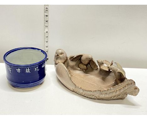A piece of art pottery in the form of an egg basket and a antique cobalt blue planter, shipping unavailable