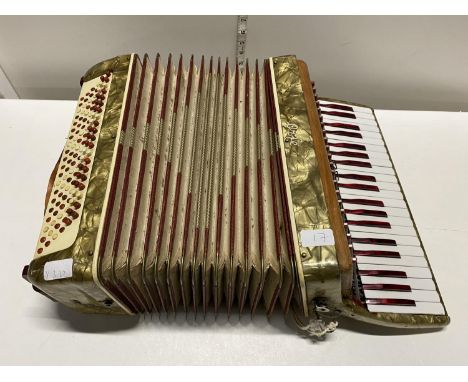 A vintage Orfeo Accordion (needs a new strap), shipping unavailable