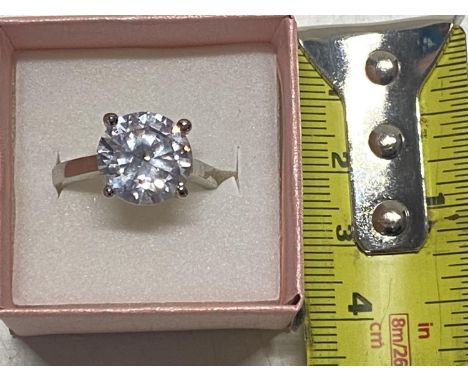 A stamped 925 silver ring with very large white stone