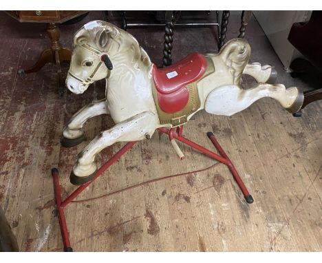 A vintage mid century child's tin plate rocking horse made by Mobo approx L100cm x H90cm, shipping unavailable