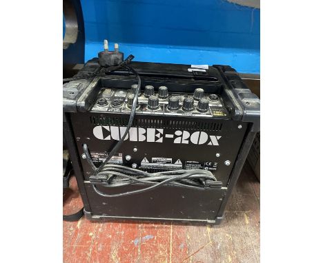 A Cube amplifier (untested).  shipping unavailable