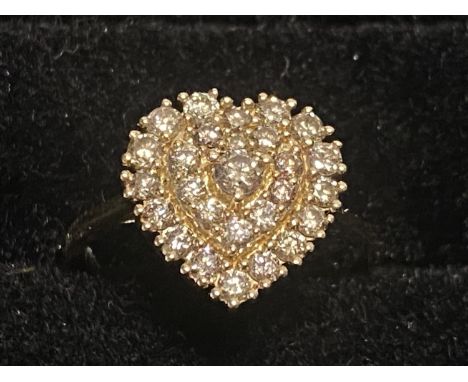 A hallmarked 9ct gold and heart shaped diamond cluster ring size L1/2 2.35g