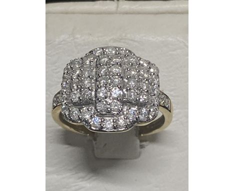 A hallmarked 9ct gold and diamond cluster ring size N 4.11g