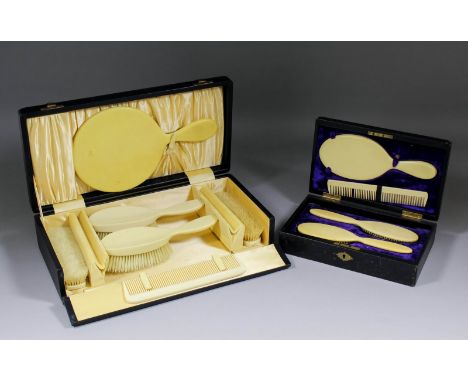 A Victorian seven piece ivory backed dressing table set, comprising - two hair brushes, two clothes brushes, mirror and comb,