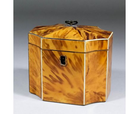 A George III blonde tortoise-shell octagonal tea caddy with concave corners and domed lid, fitted single compartment, 5ins x 