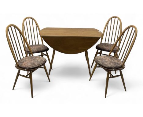 Lucian Ercolani for Ercol - mid-20th century elm dining table, oval top with two drop leaves, raised on splayed and tapered s