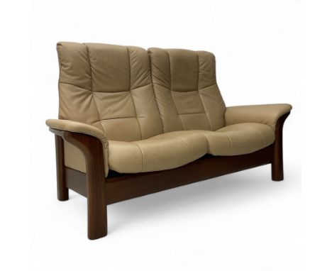 Ekornes Stressless - two-seat beech framed sofa, upholstered in beige-brown leather with stitched panel detailing, featuring 
