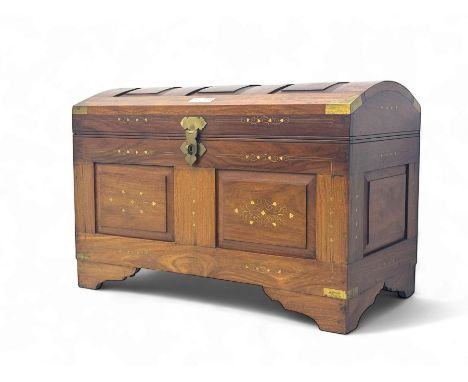 Mid-to-late 20th century Eastern brass inlaid hardwood trunk, the hinged domed top enclosing removable compartment with three
