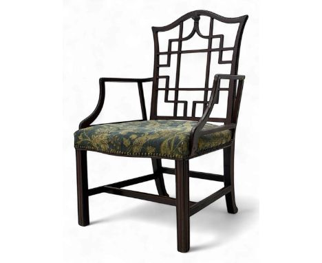Early 20th century mahogany Cockpen armchair, pierced geometric lattice back and arched crest rail, open arms extending from 