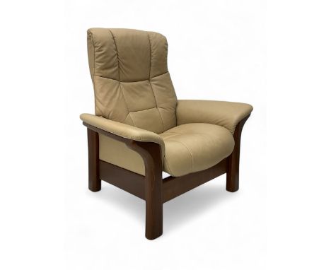 Ekornes Stressless - beech framed armchair, upholstered in beige-brown leather with stitched panel detailing, featuring curve
