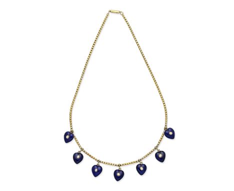 ENAMEL AND SEED PEARL NECKLACE, CIRCA 1860The snake-link chain suspending seven heart-shaped charms, decorated with blue enam