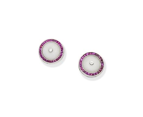 RUBY, AGATE AND DIAMOND EARSTUDSEach circular agate plaque set with a central cushion-shaped diamond within a surround of cal
