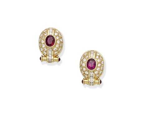 RUBY AND DIAMOND-SET EARRINGSEach set with oval-cut rubies within a brilliant and baguette-cut diamond surround, with cabocho