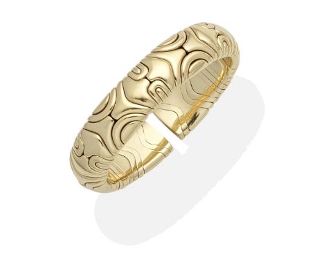 BANGLEThe sprung bangle composed of interlocking geometric links, inner circumference approx. 15.5cmFor further information o