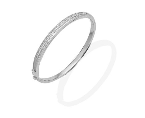DIAMOND-SET BANGLEThe hinged bangle set to the front with princess-cut diamonds, diamonds approx. 2.60cts total, inner circum