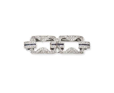 DIAMOND AND SAPPHIRE DOUBLE CLIP BROOCHEach openwork plaque set with single-cut diamonds and rectangular, step-cut sapphires,