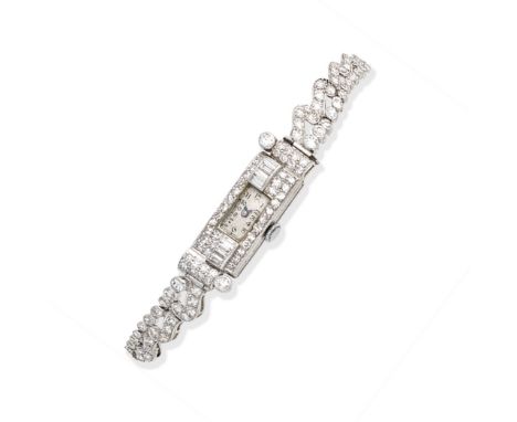 ART DECO DIAMOND DRESS WATCH, CIRCA 1925The rectangular dial with Arabic numerals, within a single and baguette-cut diamond b
