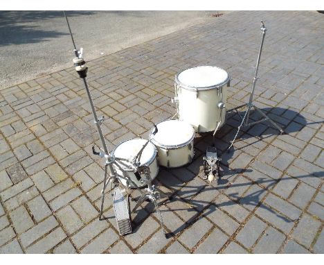 A set of three vintage tom-toms by Tacton and a collection of vintage drum hardware by D B M (qty)