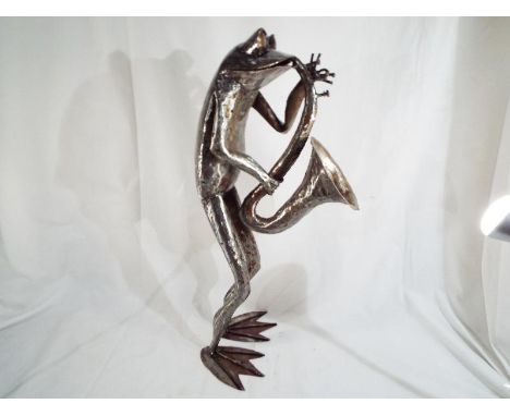 Modern Art - a hand-made metallic sculpture depicting a Frog playing a saxophone, 63 cm (high) - Est £80 - £120