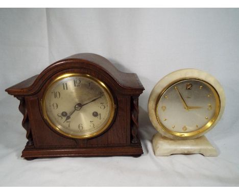 An oak cased mantle clock with barley twist decoration and columns and a further clock marked Lashof to the face (2)