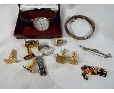 A gentleman's Rotary watch with black leather strap, boxed and a small quantity of costume jewellery to include bangles, ring