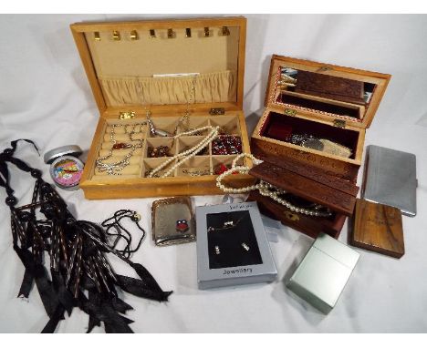 Three jewellery boxes containing a quantity of costume jewellery to include a small amount of silver stamped 925, a plated ca