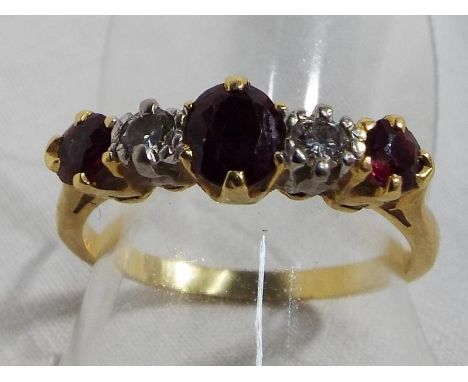 A lady's gold ruby and diamond ring, size O, approximate weight 2.96 grams Est £200 - £300