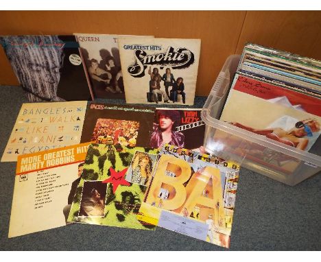 1970s / 1980s Rock and Pop - a collection of approximately 50+ 33.3 rpm vinyl record albums to include Rolling Stones, Wings,