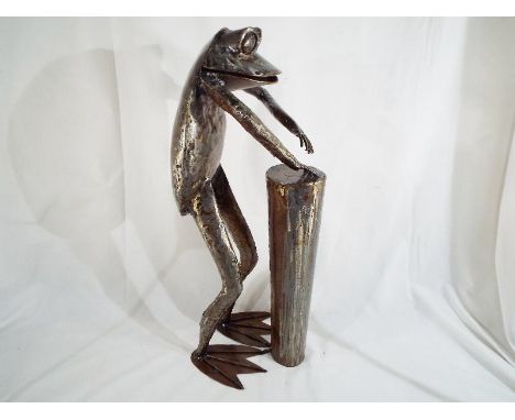 Modern Art - a hand-made metallic sculpture depicting a Frog playing a djembe, 60 cm (high) - Est £80 - £120

