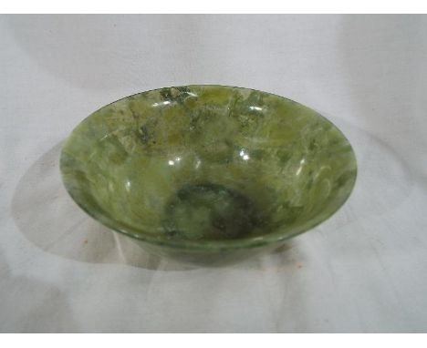 A Chinese jade mottle spinach green Celadon and hard stone bowl, 12.5cm diam Est £50 - £100