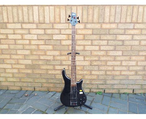A Vintage bass guitar, with soft case - Estimate £30 - £50