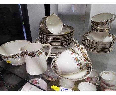 Tea service - approximately 34 pieces of Wellington china part dinner service consisting of plates, side plates, cups, saucer