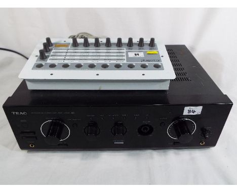 A Teac integrated stereo amplifier model A-R610 and a U/Audio plugiator effects unit (2)