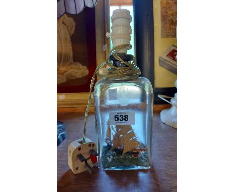 A vintage ship in a bottle table lamp