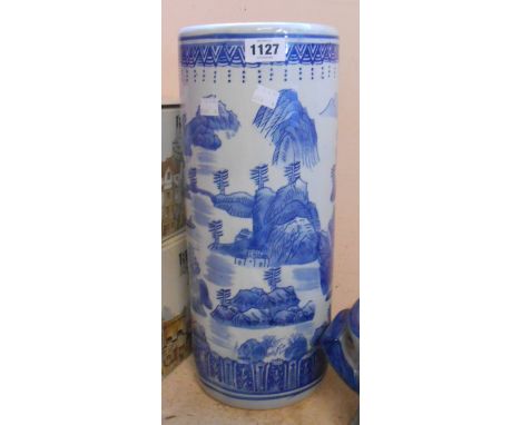 A modern Chinese ceramic stick stand with blue and white transfer printed decoration