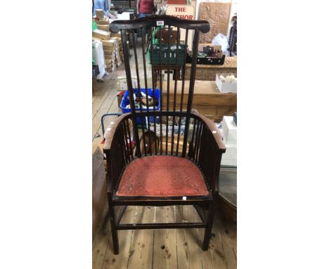 An early 20th Century stained wood framed high stick back elbow chair with upholstered seat panel, set on square front suppor