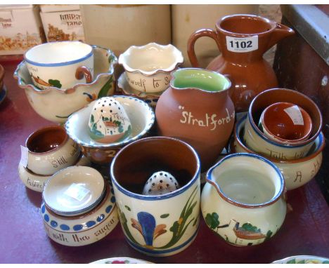 A quantity of assorted Torquay motto and other ware including dishes, bowls, cups, etc.