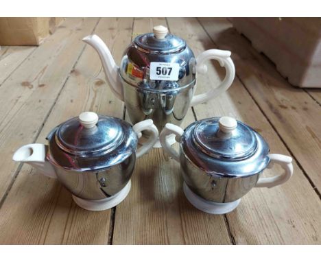 A mid Century Art Deco Heatmaster coffee set comprising coffee pot, cream jug and sucrier, all set in insulated chrome plated