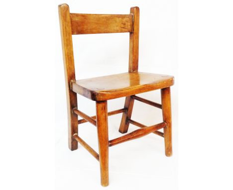 A 1937 London County Council stained beech and mixed wood child's school chair with moulded solid seat and simple turned supp