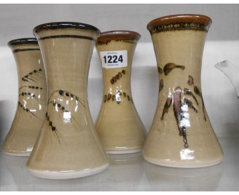 Four Jeremy Leach Lowerdown Pottery vases of waisted form with brush decoration on an oatmeal glaze