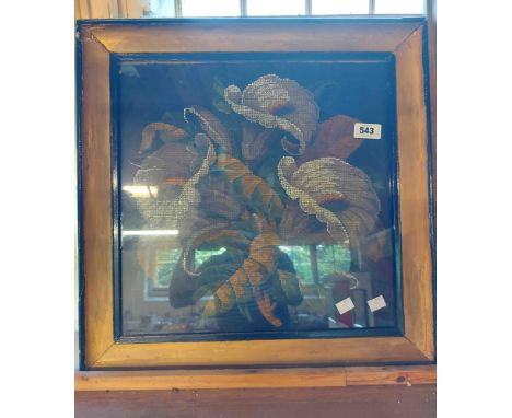 A large antique Berlin woolwork tapestry panel with beaded highlighting, set in a later painted frame