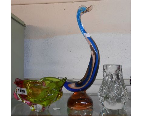 A large Murano glass figurine depicting a long necked duck - sold with a clear Liskeard glass textured vase and a Murano colo