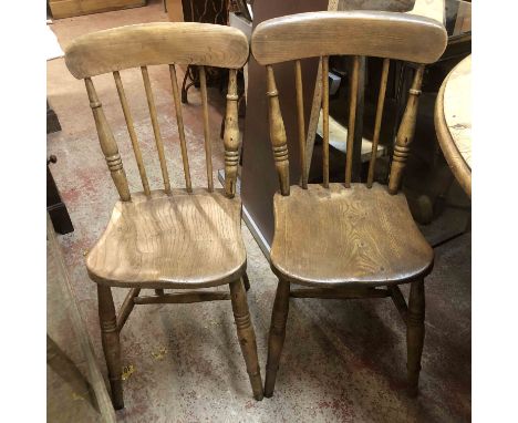 A harlequin set of four stick back standard chairs with moulded solid elm seats - sold with two others - various condition